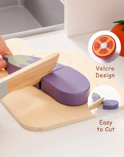 Children's kitchen play set with cutting board and toy knife, emphasizing a velcro design and ease of use.