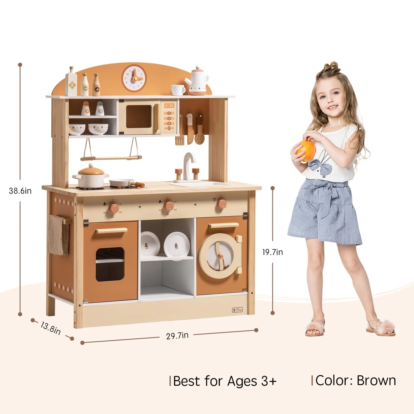 Wooden play kitchen set with measurements and a child standing next to it on a white background